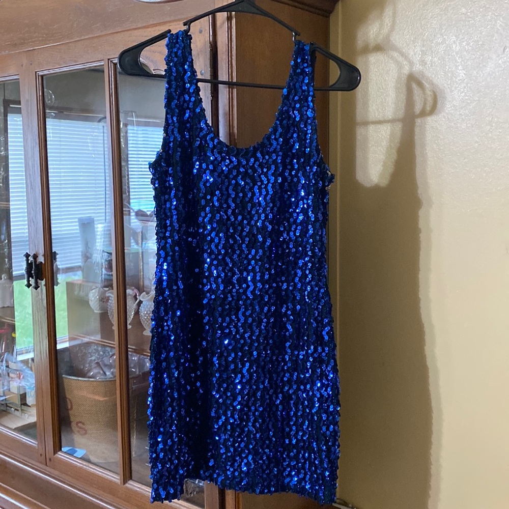 Tight fitting through sequence dressed, used for a Halloween costume size med